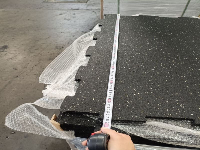 Rubber flooring in a cold garage gym
